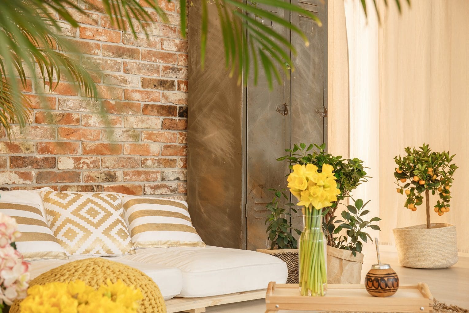 indoor garden in room with brick wall wellness feature